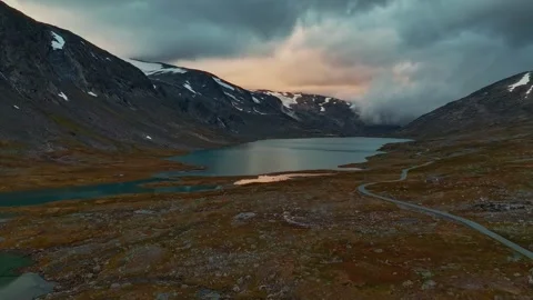 Time lapse of White camper van parked by mountain lake at scenic sunset Stock Footage 331967645