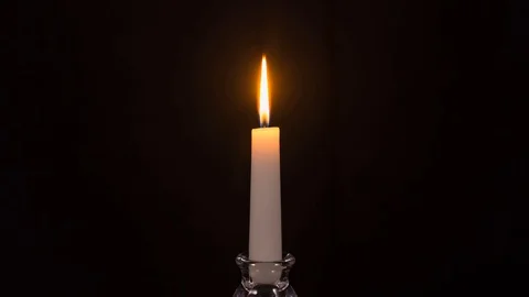 Time-lapse of a white candle burning out Stock Footage 129033899