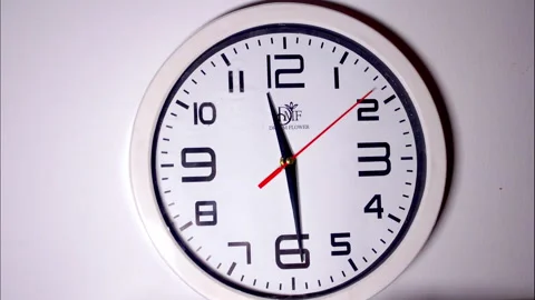 Time Lapse of White Circular Wall Clock with Red Second Hand Stock Footage 337082004