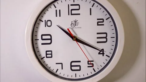 Time-Lapse of White Circular Wall Clock with Fast Red Second Hand Stock Footage 337789706