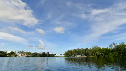 Time Lapse of white cloud and blue sky on leak at band Tao beach Phuket Stock Footage 153099782