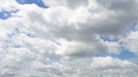 Time-lapse of the white cloud moving and transforming on the sunny day Stock Footage 90987551
