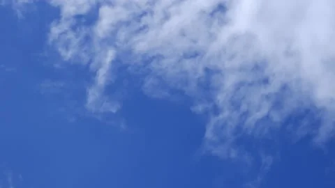 Time lapse of white cloud moving in the blue sky. Stock Footage 133876797