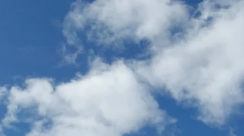 Time-lapse of white Clouds and Blue Sky Video stock 22062399