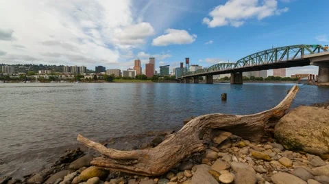 Time lapse of white clouds and blue sky over downtown skyline of Portland Oregon Stock Footage 66525812