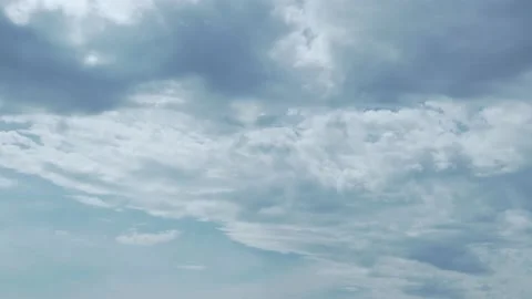 Time Lapse of White Clouds in a Blue Sky. Background of Blue Sky and Transformin Stock Footage 153613973