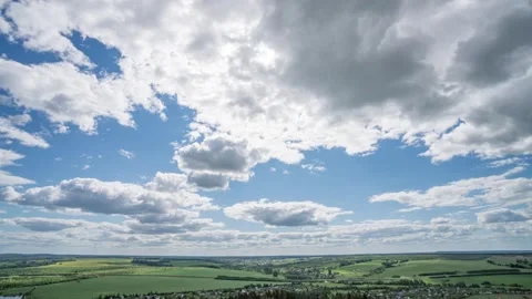 Time Lapse of White Clouds Drifting Across Blue Sky Background Stock-Footage 332709202