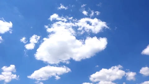 Time lapse white clouds float in the blue sky Stock Footage 134336951