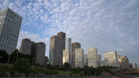 Time lapse of the white clouds flying over the city skyline of Beijing Stock Footage 94641989