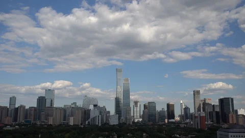 Time lapse of the white clouds flying over the skyline of Beijing Stock-Footage 94706403