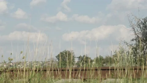Time lapse of white clouds movement over old railroad tracks in eastern euro 스톡 동영상 205100440