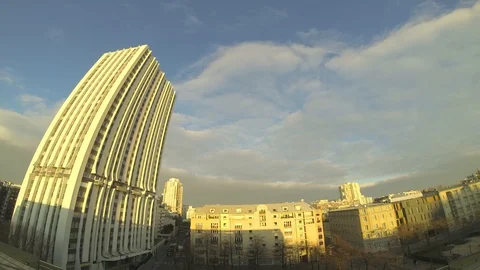 Time-lapse of white clouds moving over the building in Paris city Stock Footage 106150272