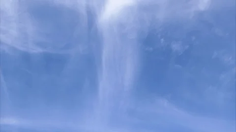 A time lapse of white clouds moving across a blue sky. 库存影片 108312907