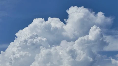 A time lapse of white clouds moving across a blue sky. Stock-Footage 119002072