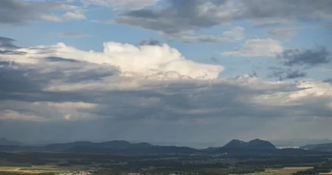 Time lapse white clouds moving over Ljubljana basin Stock Footage 135405230