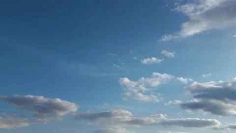 Time-lapse of White Clouds Moving Over Snowy Mountains 스톡 동영상 332757358