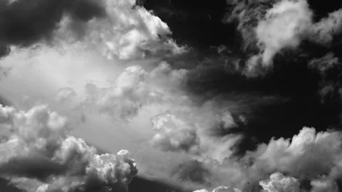 Time-lapse of white clouds moving rapidly across a black background..Fast-m.. Stock Footage 336904386