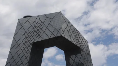 Time Lapse of white clouds past the China Central Television Stock Footage 51140701