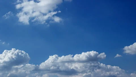 Time-lapse of White clouds sweeping across the sky, revealing the calm beau.. Stock Footage 321348000