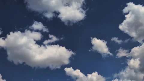 Time-Lapse: White Cumulus Clouds Shape-Shifting in Blue Sky Stock Footage 285727132