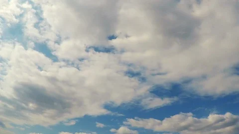 Time lapse of white fluffy clouds and blue sky Stock Footage 89401801