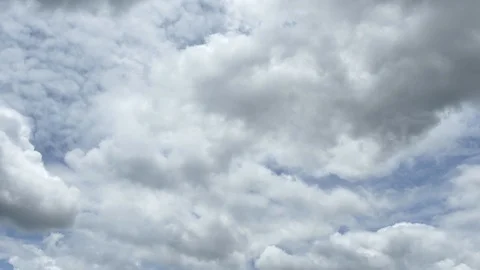 Time Lapse of White fluffy clouds in the blue sky background. Stock Footage 94226091