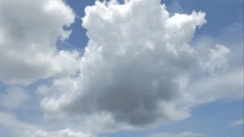 Time Lapse of White fluffy clouds in the blue sky background. Stock Footage 94226390