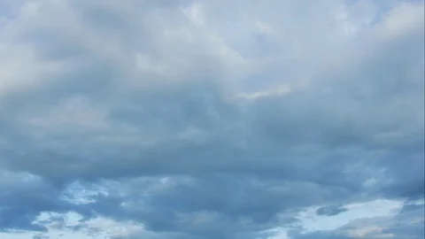 Time Lapse of White fluffy clouds in the blue sky background. Stock Footage 94229920