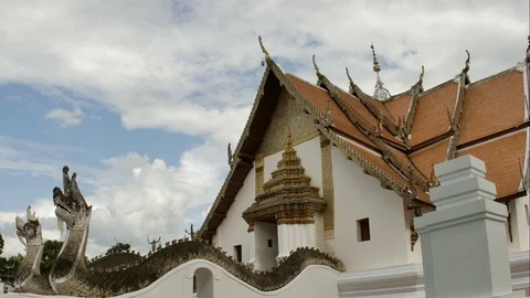 Time Lapse of White fluffy clouds in the blue sky and Buddhist temple Stock Footage 94230328