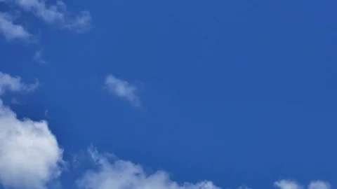 Time Lapse of White fluffy clouds in the blue sky background Stock Footage 94271167