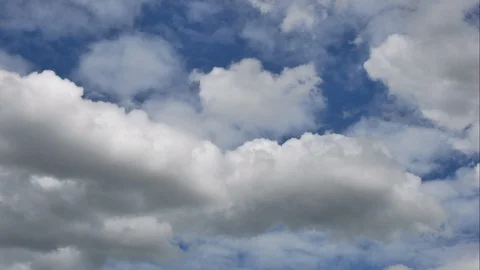 Time Lapse of White fluffy clouds in the blue sky Stock Footage 94466085