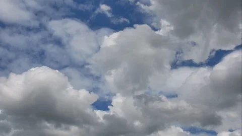 Time Lapse of White fluffy clouds in the blue sky Stock Footage 94577501