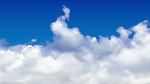 Time lapse of white fluffy clouds over blue sky. Stock Footage 94859824