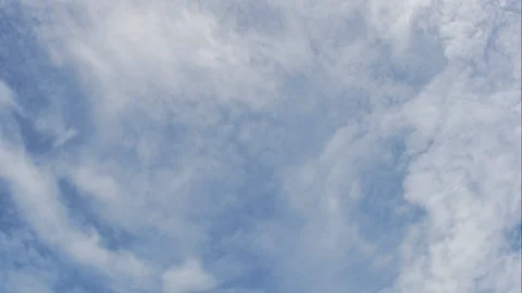 Time Lapse of White fluffy clouds in the blue sky background Stock Footage 97869601