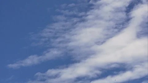 Time Lapse of White fluffy clouds in the blue sky background Stock Footage 109272967