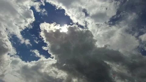 Time lapse white fluffy clouds 4K Stock Footage 136270901