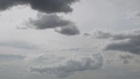 Time Lapse of White Gray Cumulus Clouds in Sunlight in the Sky After Summer Rain Stock Footage 233280456