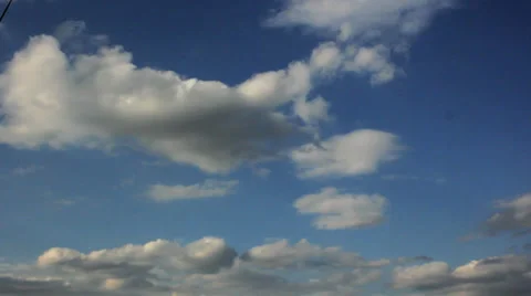 Time Lapse white puffy clouds in deep blue sky Stock Footage 35094768