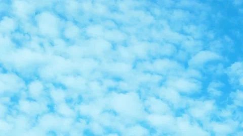 Time Lapse of White Puffy Cumulus Clouds in a Sunny Blue Sky. Blue Skyscraper wi Stock Footage 230226016