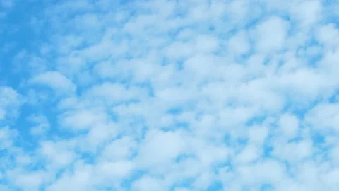 Time Lapse of White Puffy Cumulus Clouds in a Sunny Blue Sky. Summer Blue Skyscr Stock Footage 230226098