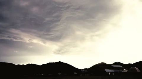 Time lapse of wickedly intense clouds roiling and flowing over peaks Stockbeeldmateriaal 68148266