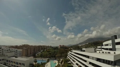 Time lapse of a wide panoramic view of a modern Spanish city with residential Vidéo 333031455