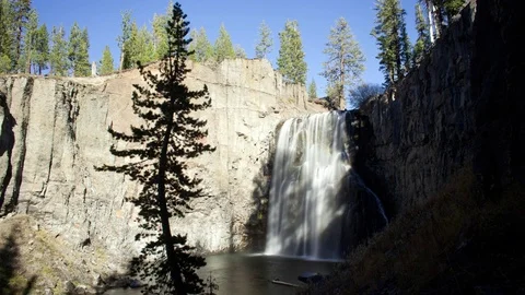 Time lapse wide shot of Rainbow Falls in Devils Postpile National Monument Stock Footage 73268503