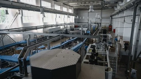 Time lapse wide shot of water filling line - Water bottling line for processing Stock Footage 75090042