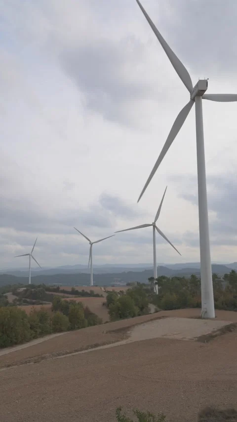 Time lapse of a wind farm under cloudy skies. Environment concept. Stock Footage 220441853