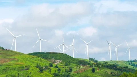 Time lapse of wind mill turbine rotation on the cloudy sky Stock Footage 82207063