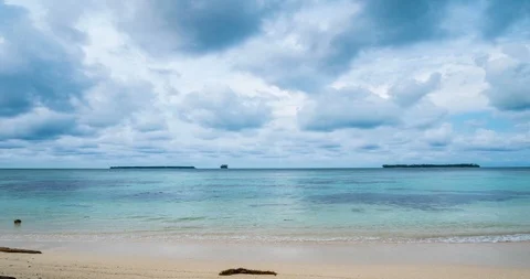 Time lapse: wind storm over tropical beach and sea dramatic sky moving clouds gl Stock Footage 107101376