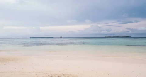 Time lapse: wind storm over tropical beach and sea dramatic sky moving clouds gl Stock Footage 107101477