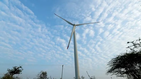 Time Lapse of Wind Turbine Against Dramatic Cloudy Sky in Gujarat, India Stock Footage 341387137