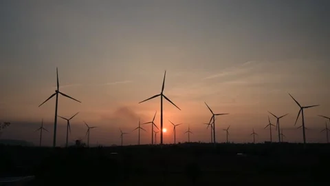Time lapse of wind turbines are a large source of natural energy Stock Footage 254222747